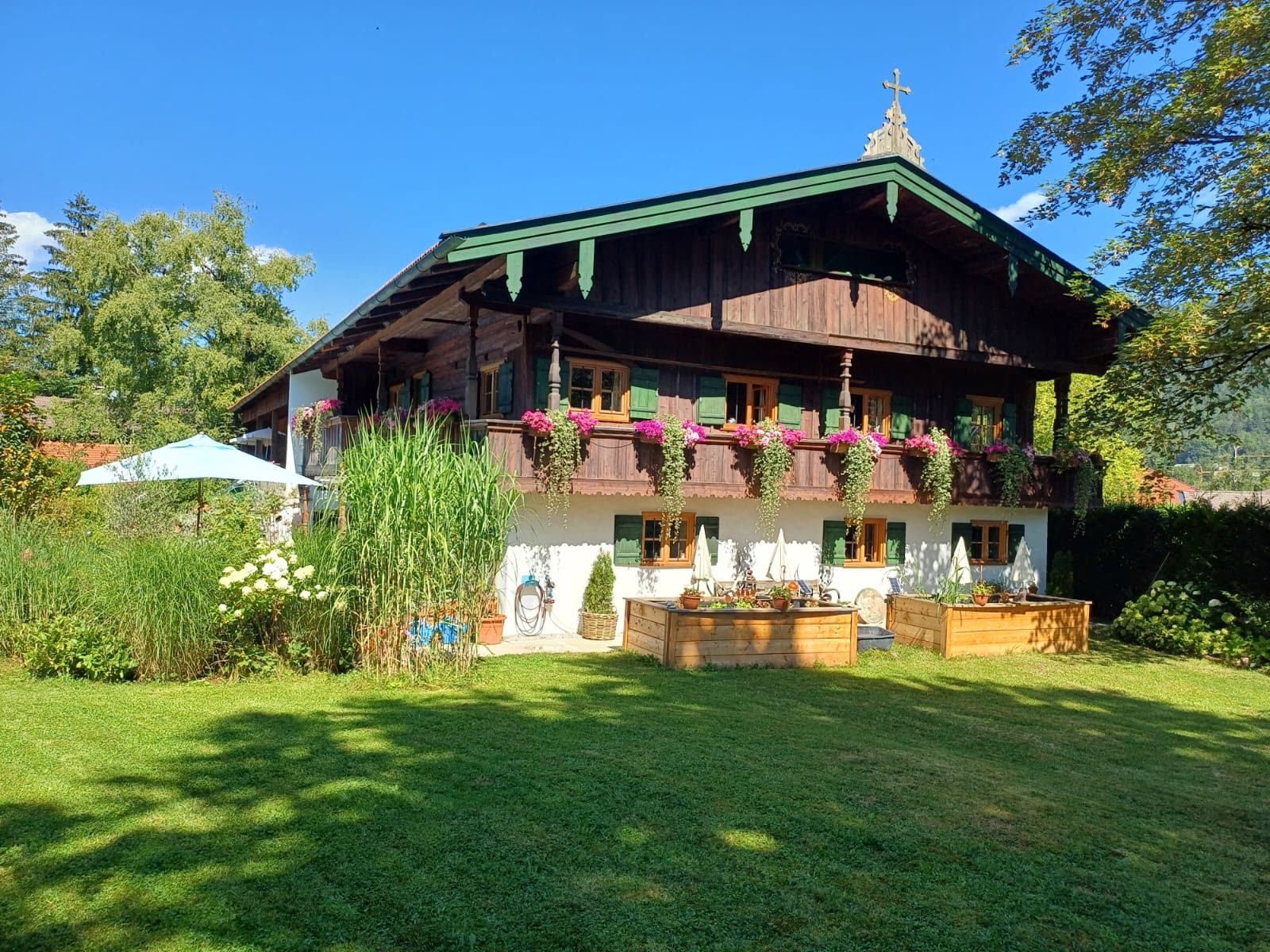 The same listed farmhouse after renovation of timber and render