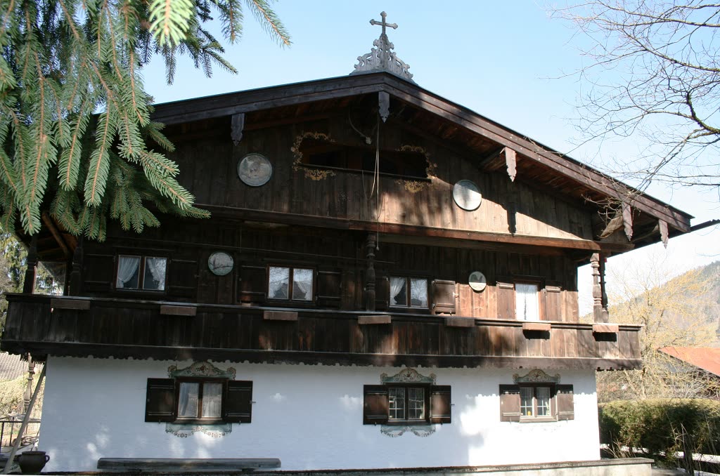 Listed farmhouse before renovation, timber heavily weathered
